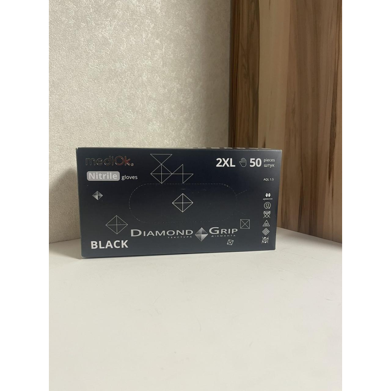 Рукавички нітрилові GRIP BLACK розмір 2XL (щільність 8,6 г) підвищеної міцності чорні неопудрені (25пар/1уп) Mediok Рукавички нітрилові GRIP BLACK розмір 2XL (щільність 8,6 г) підвищеної міцності чорні неопудрені (25пар/1уп) Mediok