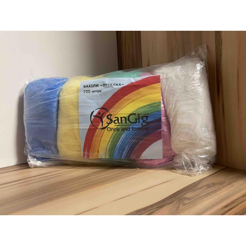 Бахіли 3.5 г, Веселка (50 пар/уп.), SanGig Бахіли 3.5 г, Веселка (50 пар/уп.), SanGig